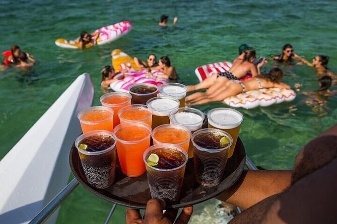 Boat Party with Drinks and Snacks with Transportation Included - Stop 3: The Natural Pool Stop with Music and an Adult Open Bar