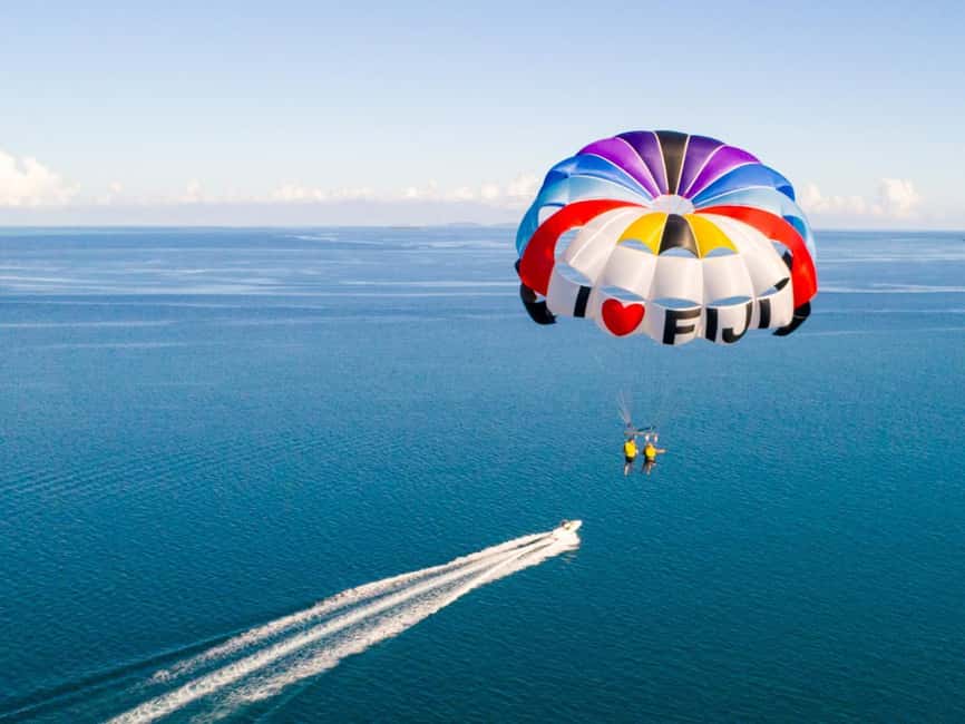 Buggy Tour and Parasailing Experience - Getting There: Coach Ride, Vehicle Changes, and Quick Guided Time