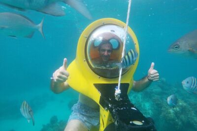 Experience a Submarine Scooter with ScubaDoo Punta Cana - The glass-bottom boat and transfers: where your half-day starts