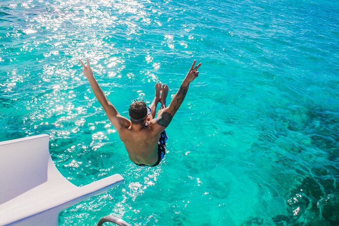 Float & Feast Private Party Cruise with Premium Buffet & Open Bar - Onboard entertainment: Dominican dancers, guide Claudia, and the water slide reality check