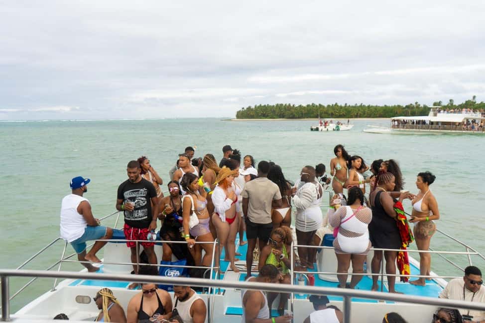From Bavaro, Punta Cana: Boat Party, Snorkeling, Drinks, Snacks, and Transportation - The Party Stretch: Slide Time, Music, Drinks, and Snacks