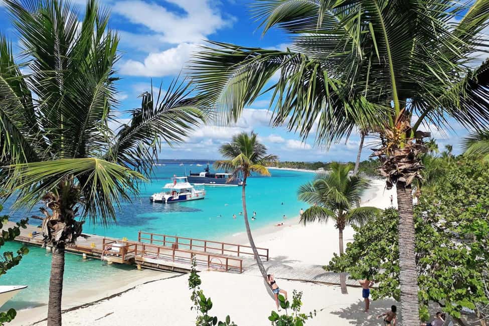 From Santo Domingo - Punta Cana: SAONA ISLAND Food & Drinks - Natural Swimming Pool: starfish, photos, and a timed swim