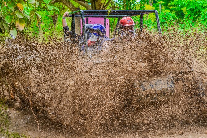 Half-Day Buggy Tour to Water cenote and Macao Beach in Punta Cana - Macao Beach After the Mud: Limestone Cliffs, Sun, and Sand Time