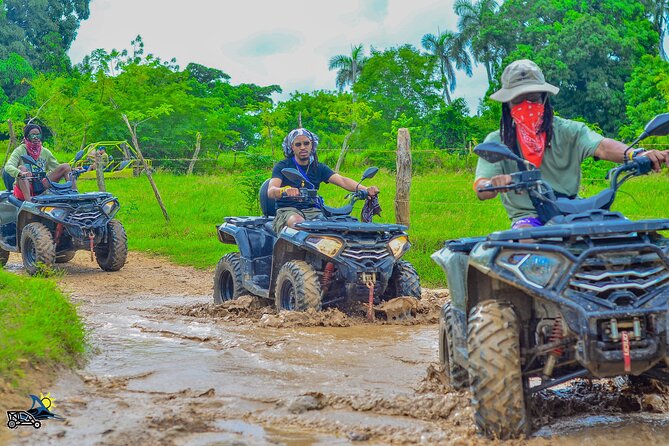 Punta Cana ATV Adventure Through Jungle Trails - Macao Beach finish: sand, waves, and limestone cliffs