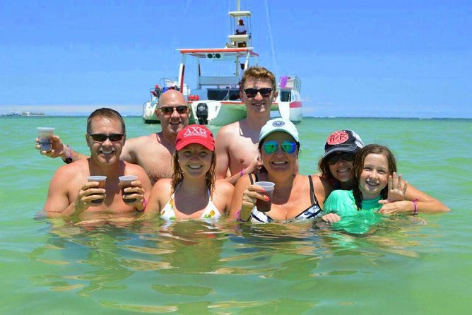 Punta Cana Booze Cruise with Snorkeling, Natural Pool & Open Bar - Music, crew energy, and the multilingual party feel