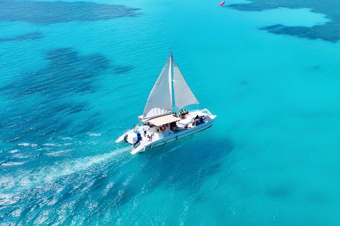 Punta Cana Catamaran Party– Snorkeling, Open Bar, Music & Pickup - Onboard Vibes: Music, Dancing, and the Group Size