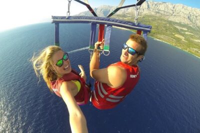 Punta Cana Combo Tour: Snorkeling, Catamaran Cruise & Parasailing - The catamaran party boat: drinks, DJ beats, and the natural pool stop