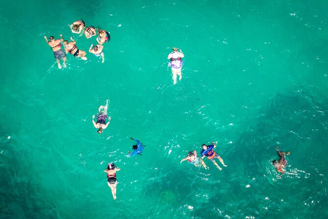 Punta Cana Private Catamaran Cruise with Drinks and Light Snacks - Stop 3: Natural Pool Shallow-Water Floating Bar and Paddleboards