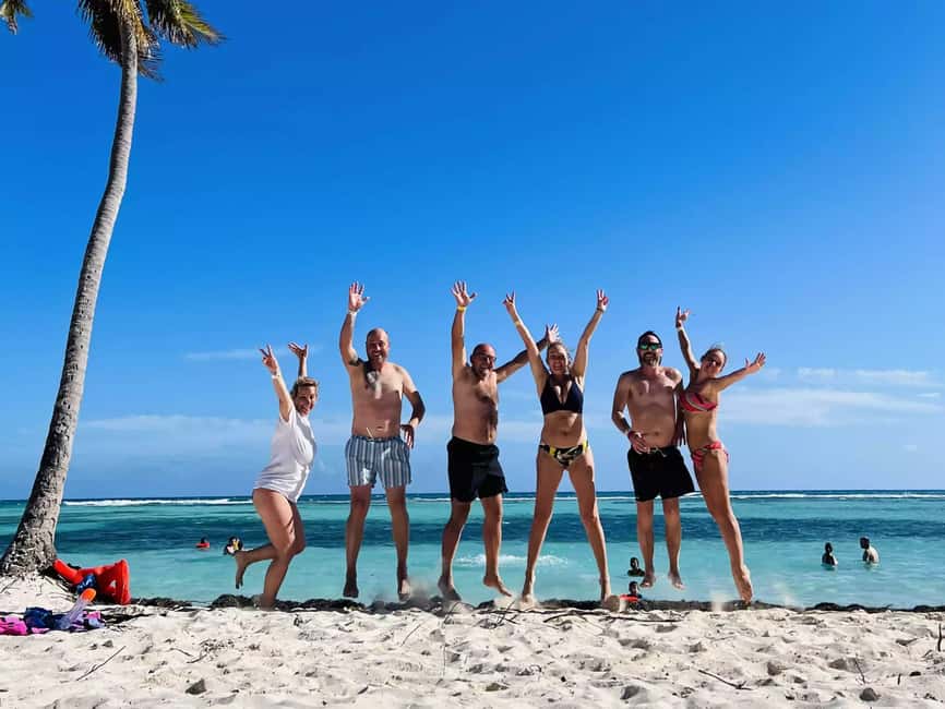 Punta Cana: Saona Island Day Trip with Blue Lagoon & Lunch - Saona Island: white sand, sunbeds, and coconut water