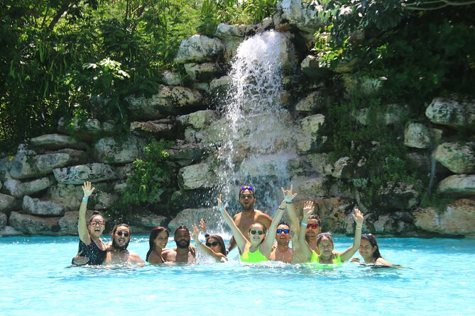 Punta Cana Ziplines, Hanging Bridge, and Waterfall Pool Adventure - Dominican village stop, coffee and cocoa tastings, and lunch