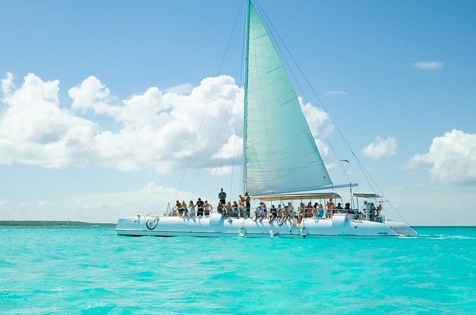 Saona Island Adventure From Punta Cana With Lunch and Transportation - The Return Catamaran: Unlimited Drinks, Snacks, and a Party Vibe