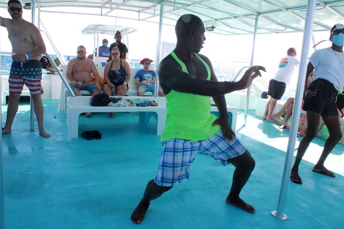 Saona Island by Paradise Travel - Catamaran return: open bar, dance show, and the party-paced cruise