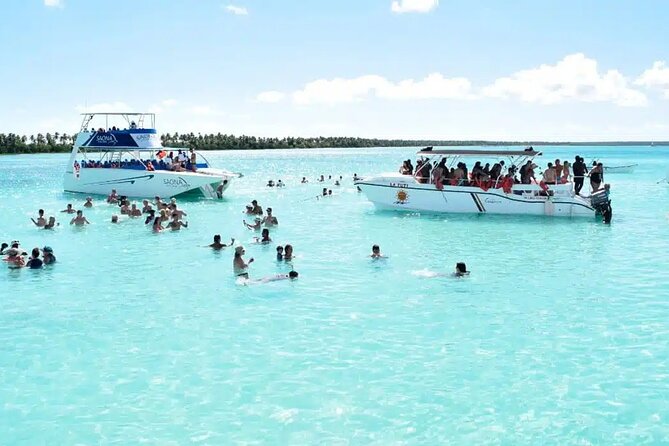 Saona Island Tour From Santo Domingo with Lunch, Open Bar, Pickup - The Return by Catamaran: Animators, Entertainment, and a Long Boat Ride